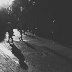 Woman walking on road