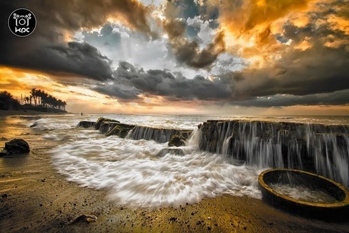 sunset, water, sky, scenics, beauty in nature, cloud - sky, beach, sea, tranquil scene, shore, nature, tranquility, orange color, surf, wave, dramatic sky, idyllic, cloudy, motion, horizon over water