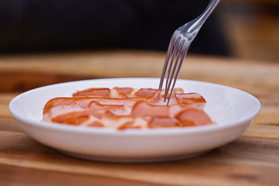 Close-up of ice cream in bowl on table