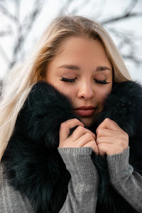 Portrait of woman in snow