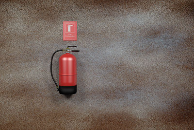 3d rendering of a fire extinguisher on a wall