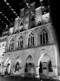 Low angle view of historical building at night