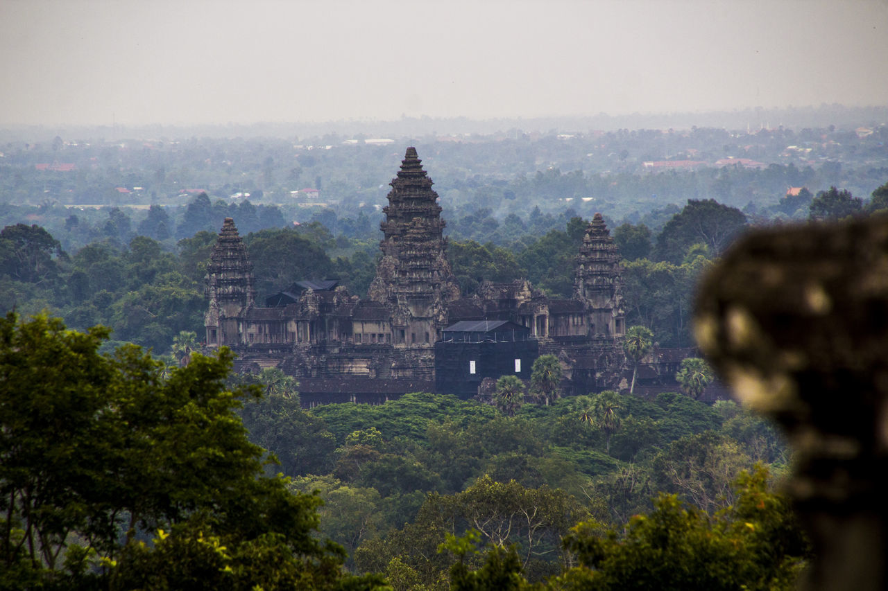 PANORAMIC VIEW OF TEMPLE AMIDST BUILDINGS