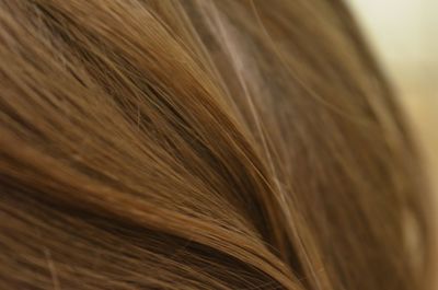 Close up of human hair on tiled floor