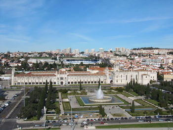 High angle view of street and buildings against sky