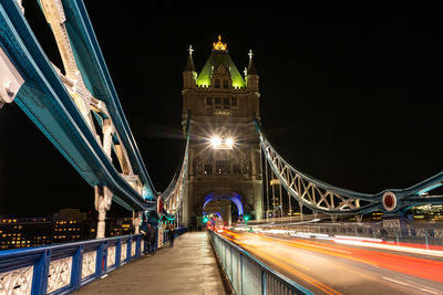 Light trails on bridge at night