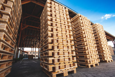 Low angle view of building under construction against sky