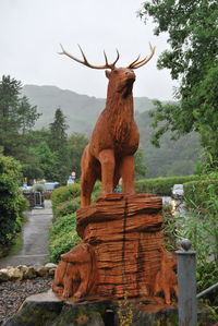 View of statue against trees