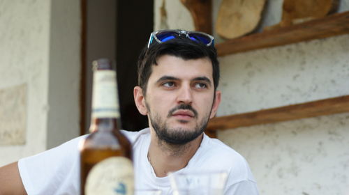 Portrait of young man looking away