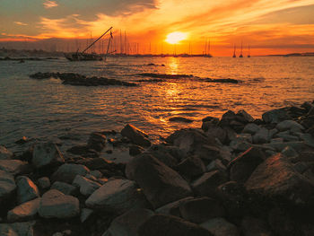 Scenic view of sea against sky during sunset