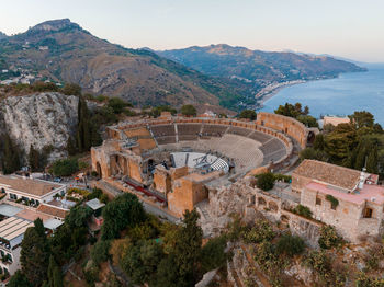 Aerial view of the ruins of the ancient greek theater in taormina, sicily