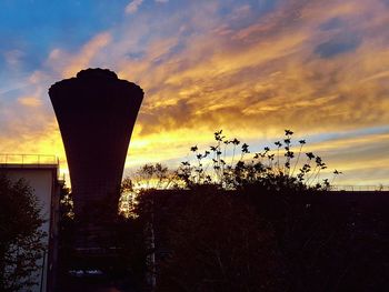 Silhouette plants against sky during sunset