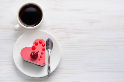 High angle view of black coffee on table