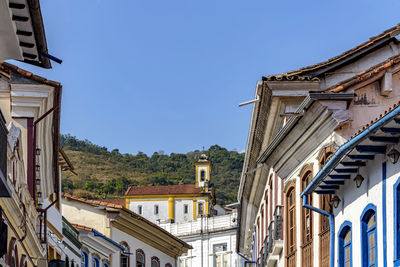 Colonial-style houses in the historic city of ouro preto in minas gerais with a church