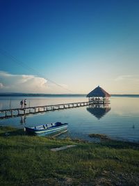 Scenic view of sea against clear blue sky