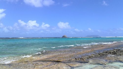 View of sea against cloudy sky