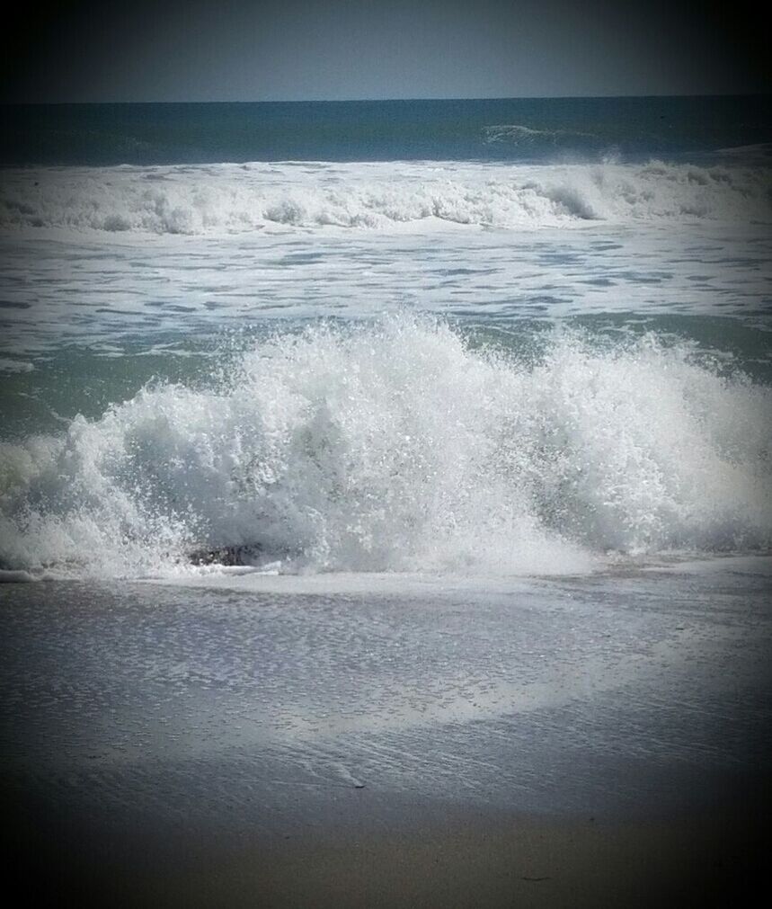 sea, water, wave, surf, horizon over water, beauty in nature, beach, scenics, motion, nature, shore, tranquil scene, tranquility, splashing, idyllic, seascape, power in nature, rippled, sky, waterfront