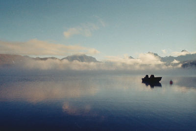 Scenic view of boat on lake