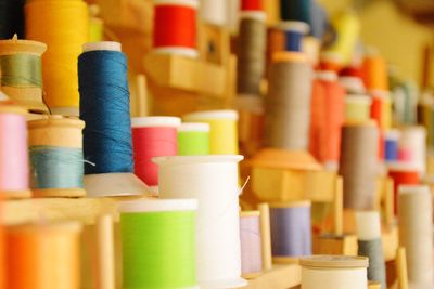 Close-up of colorful thread spools