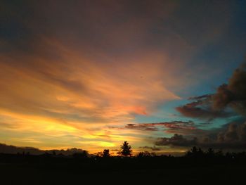 Scenic view of silhouette landscape against sky during sunset