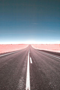 Empty road against sky