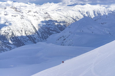 Scenic view of snowcapped mountains