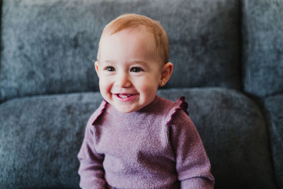 Cute baby girl at home