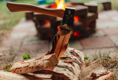 Close-up of fire on wooden log