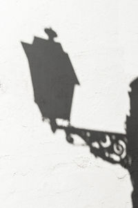 Shadow of people on wall