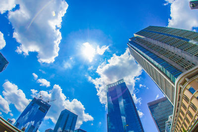 Low angle view of modern buildings against sky