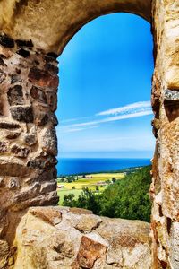 Scenic view of sea against blue sky