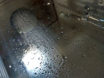 Close-up of water drops on glass