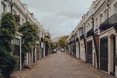 Rows of townhouses on holland park mews, london, uk.