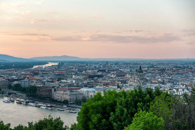 High angle view of townscape against sky at sunset