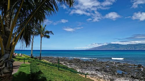 Scenic view of sea against blue sky