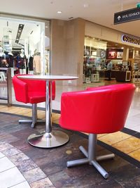 Empty chairs and table in restaurant