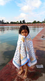 Portrait of cute girl in water
