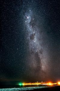 Scenic view of star field against sky at night