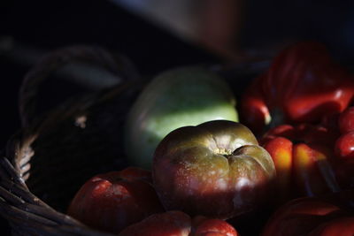 Close-up of heirloom tomatoes in basket at market