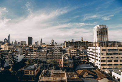 Modern buildings in city against sky