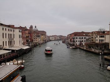 Boats moored in canal