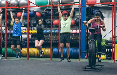 Athletes exercising in gym