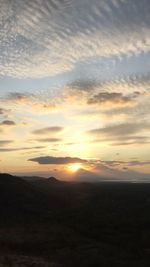 Scenic view of dramatic sky during sunset