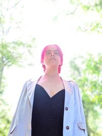 Low section of woman standing outdoors