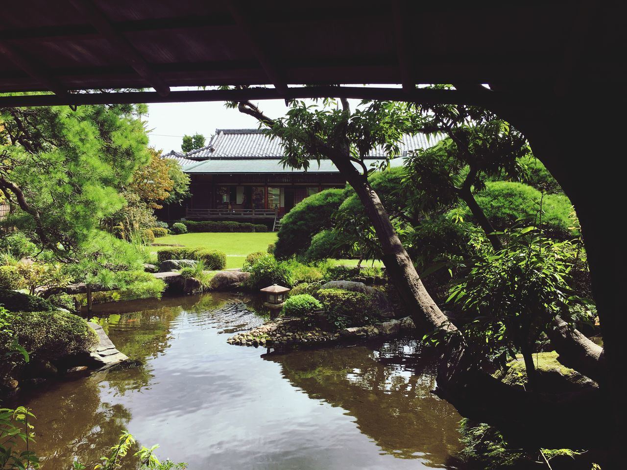 architecture, water, built structure, building exterior, tree, plant, stream, formal garden, green color, growth, arch, tranquility, day, scenics, outdoors, canal, no people, garden, tranquil scene, footpath, landscaped