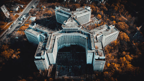 Aerial view of building by trees