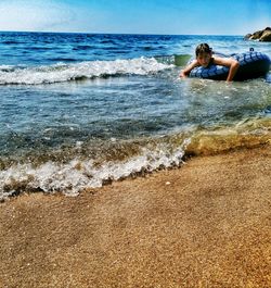 Man surfing in sea