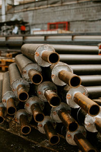 Close-up of stack of pipes