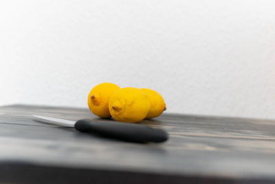 Close-up of yellow balls on table