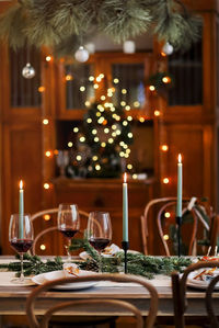 Illuminated christmas tree on table